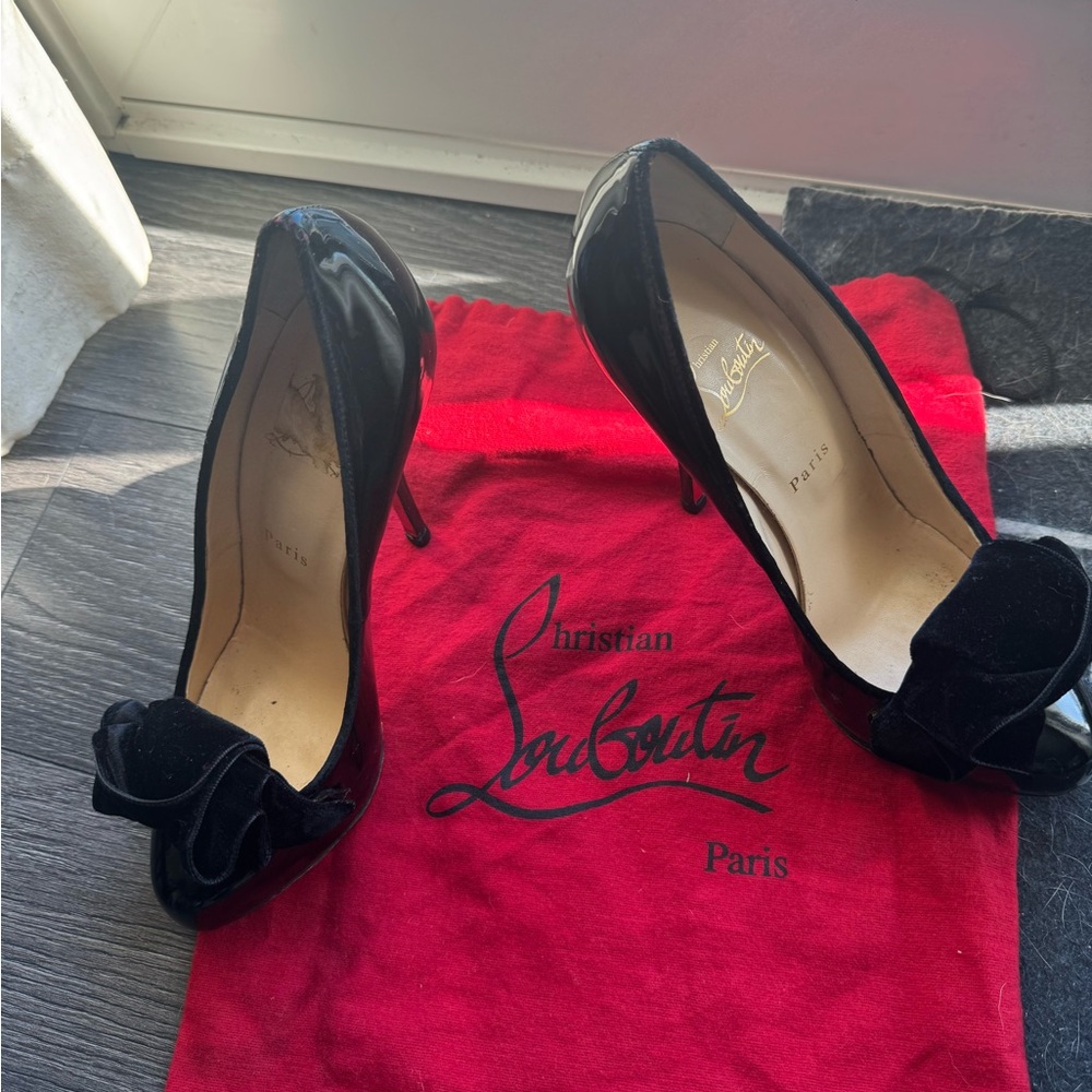 Christian Louboutin Black Heels with Bow Accent